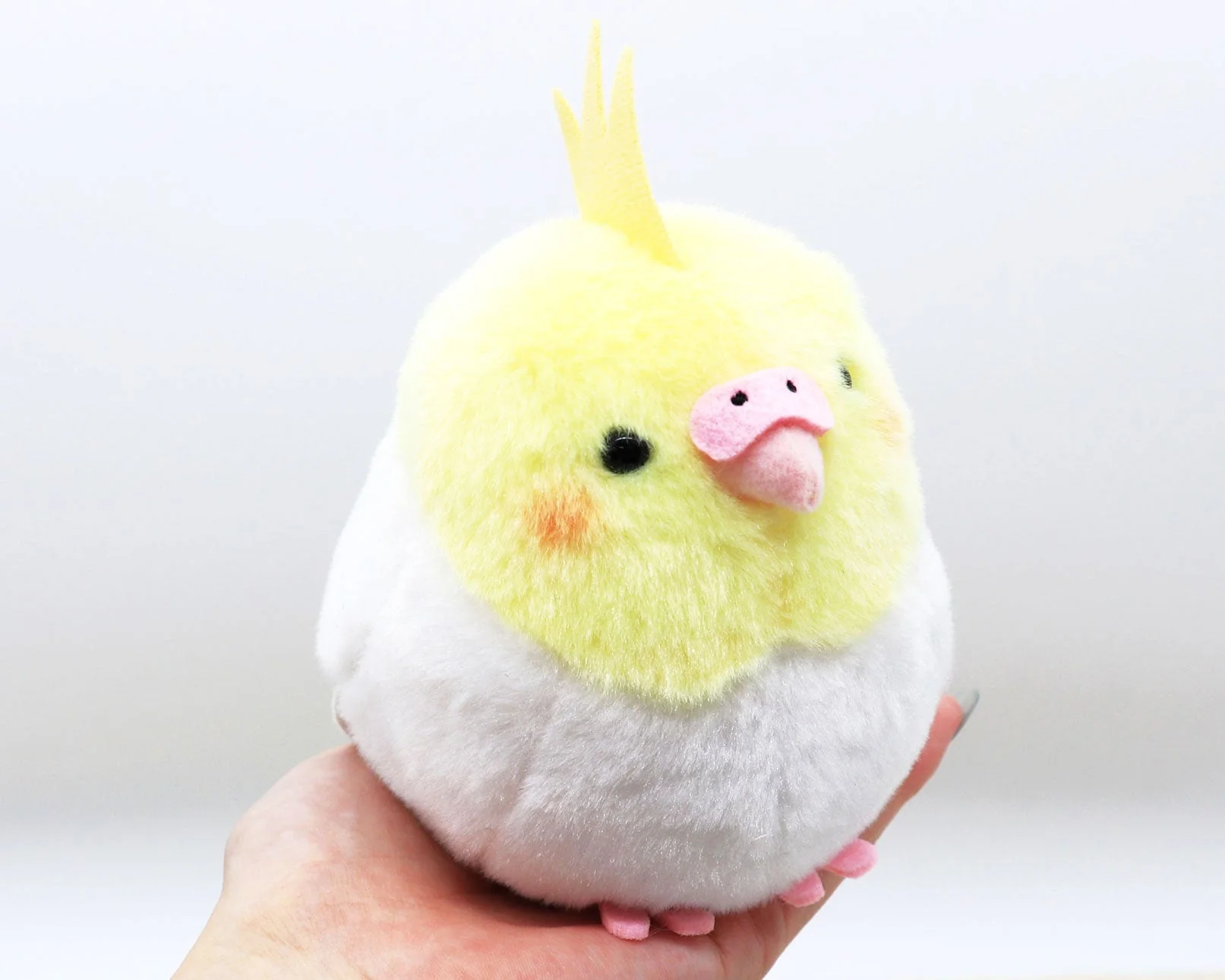 手のひらサイズのオカメインコぬいぐるみ